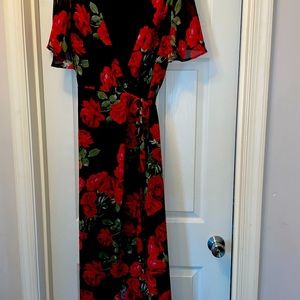A beautiful high-lo hem wraparound maxi dress from Show Me Your Mumu